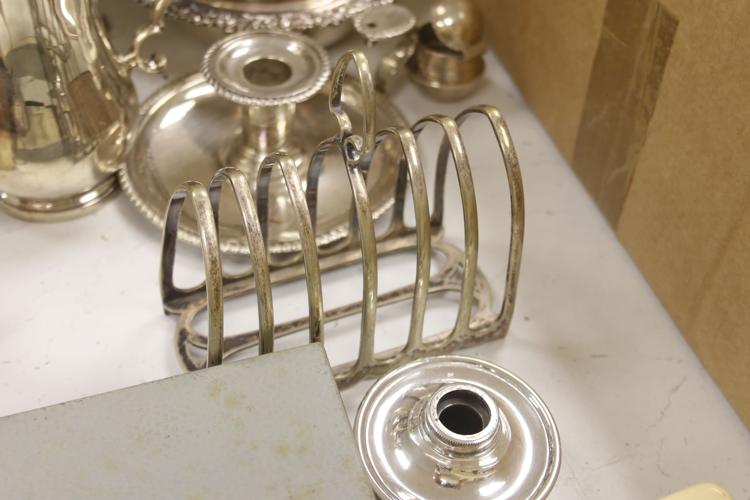 A silver plated tea kettle on stand with burner, 54cm high, and a small quantity of other plated items.